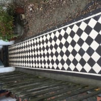 Black and white tiled garden wall completed by Aaron Steven Construction